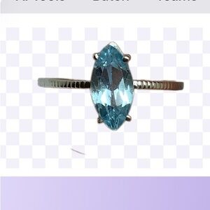Sterling silver blue topaz ring